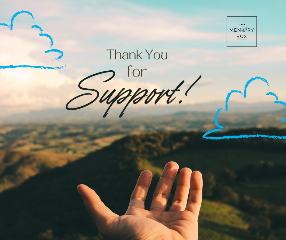 hand reaching out to the sky thanking others for support